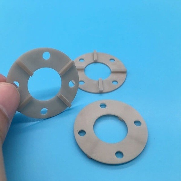 Aluminum nitride ceramic discs - precision perforated ceramic rings